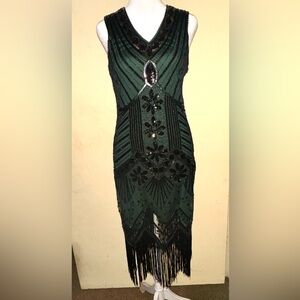 Beautiful, intricately beaded dress, size XS,  black over Dark Green lining.
